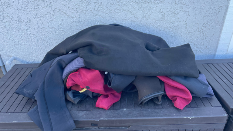 Pile of old wetsuits